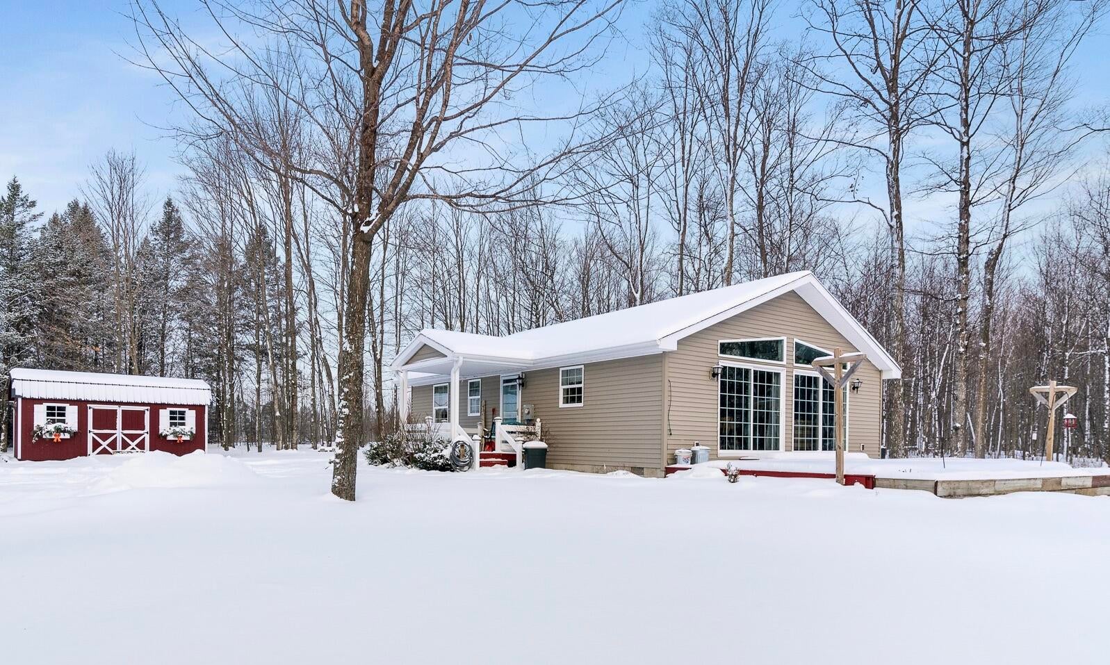 7715 Woods Homestead Road Wolverine, MI 49799 - Photo 1 of 24 Gallery Image 1