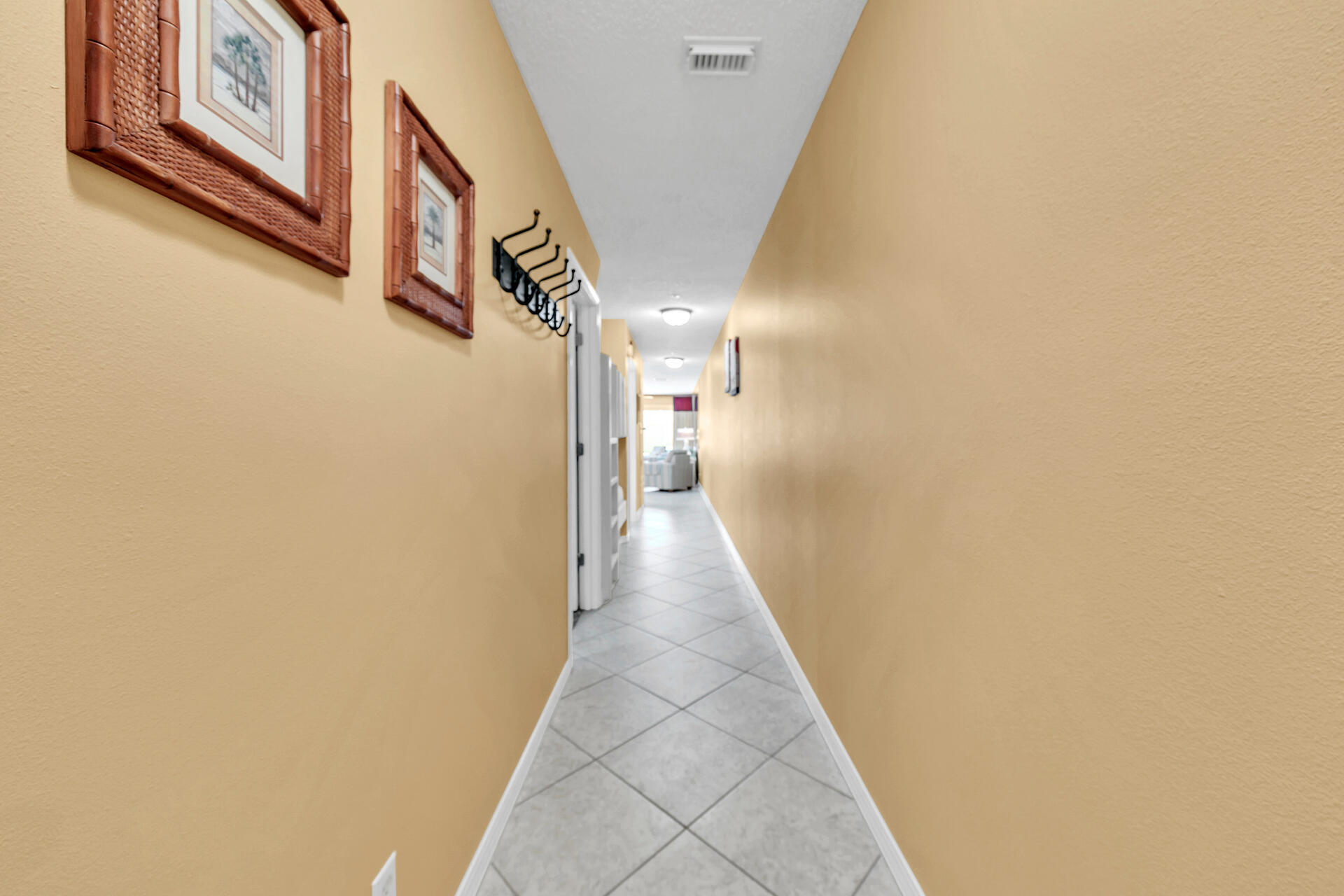 2606 Scenic Gulf Drive, Unit 4107 Miramar Beach, FL 32550 - Photo 17 of 55 a view of a hallway with staircase