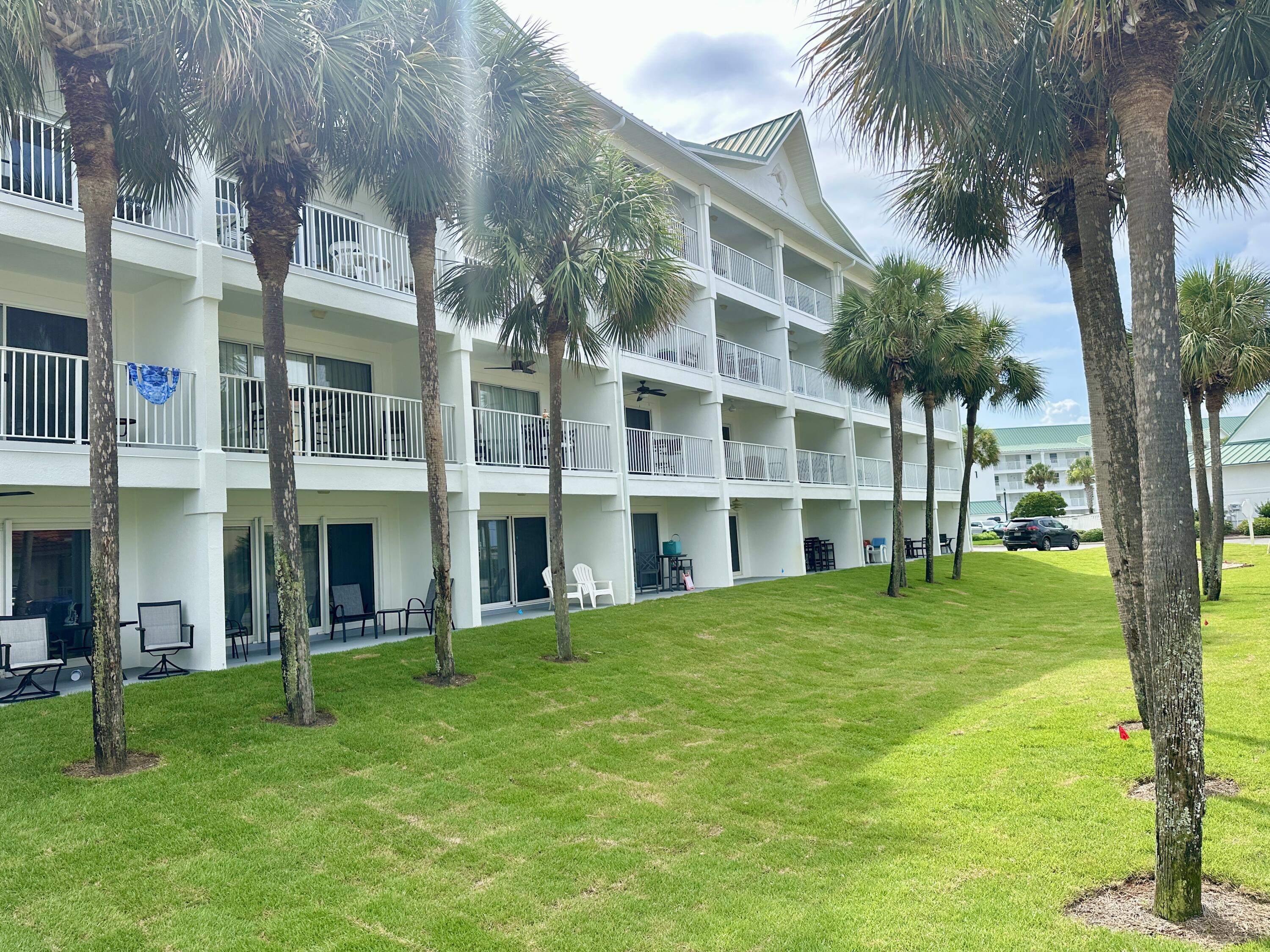 2606 Scenic Gulf Drive, Unit 4107 Miramar Beach, FL 32550 - Photo 22 of 55 a view of building with yard