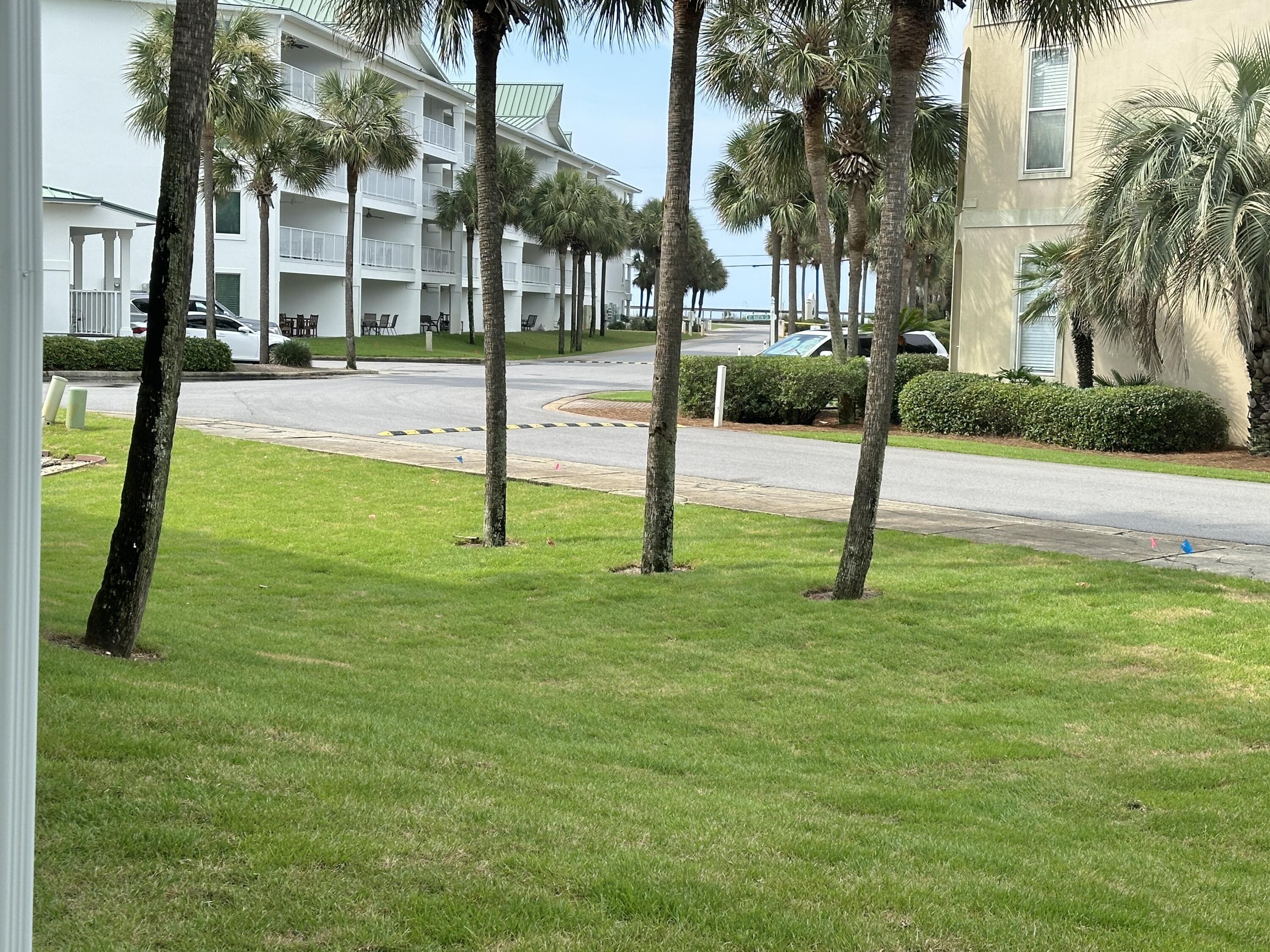 2606 Scenic Gulf Drive, Unit 4107 Miramar Beach, FL 32550 - Photo 23 of 55 a view of a park with palm trees
