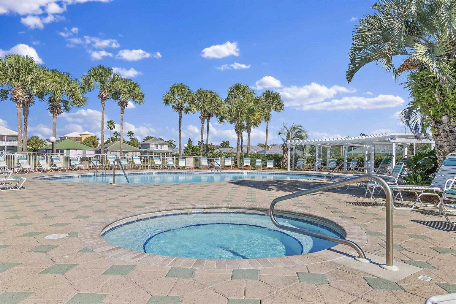 2606 Scenic Gulf Drive, Unit 4107 Miramar Beach, FL 32550 - Photo 35 of 55 a view of a swimming pool with outdoor seating