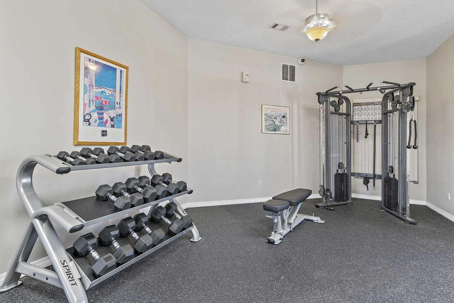 2606 Scenic Gulf Drive, Unit 4107 Miramar Beach, FL 32550 - Photo 41 of 55 a bedroom with furniture and a chandelier