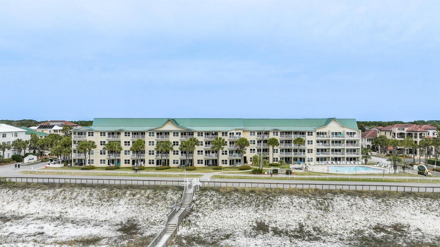 2606 Scenic Gulf Drive, Unit 4107 Miramar Beach, FL 32550 - Photo 46 of 55 a view of a large building with a yard