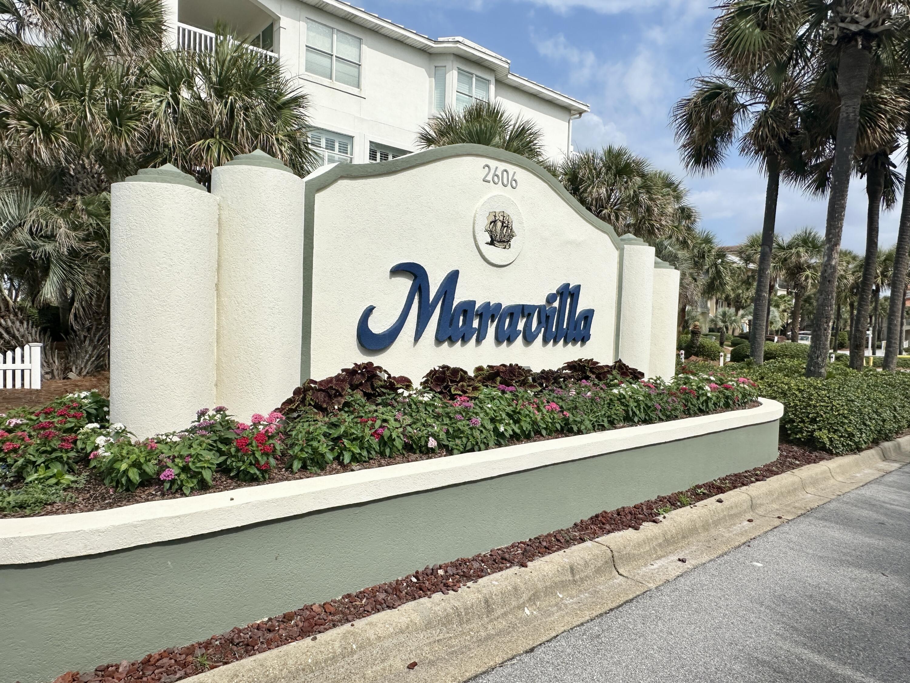 2606 Scenic Gulf Drive, Unit 4107 Miramar Beach, FL 32550 - Photo 49 of 55 a sign on the side of a building