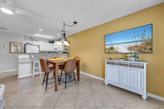 a kitchen with stainless steel appliances granite countertop a sink and a stove top oven