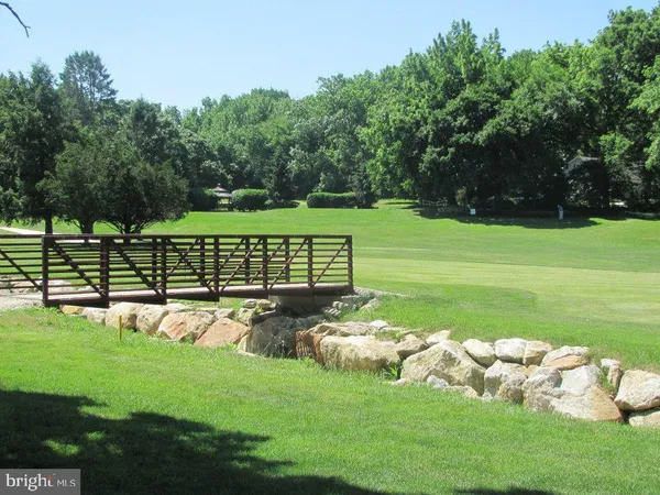 a view of a golf course with a garden