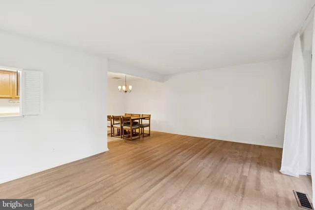 a view of a livingroom with wooden floor