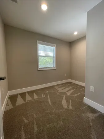 a bathroom with a sink a washer and dryer
