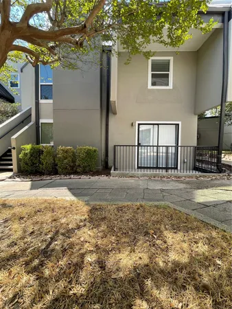 a view of a backyard of the house