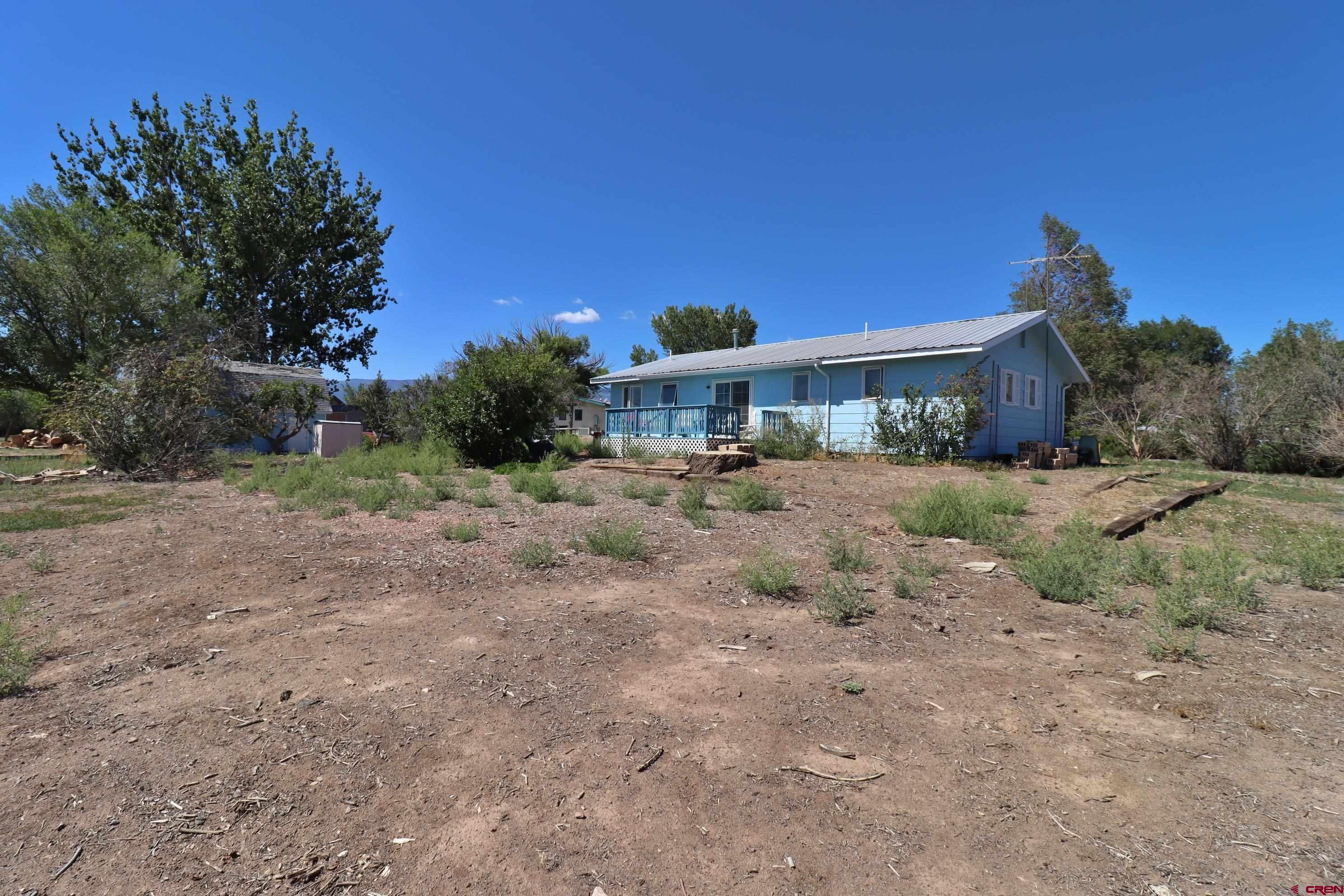 12303 West Spring Circle Eckert, CO 81418 - Photo 19 of 26 a view of a town with large trees