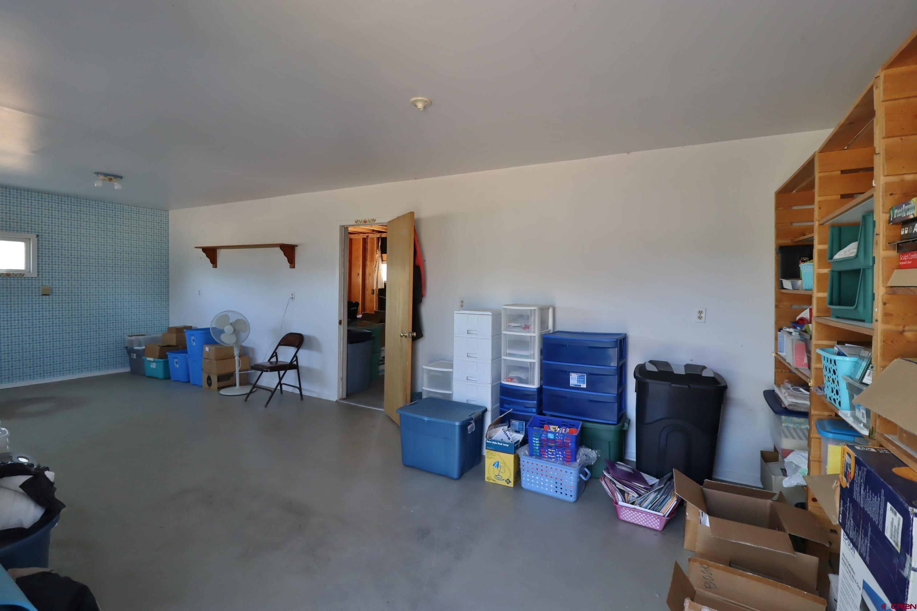 12303 West Spring Circle Eckert, CO 81418 - Photo 24 of 26 a view of a livingroom with furniture and toys