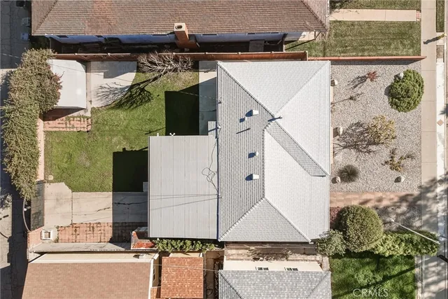 a aerial view of a house with a garage