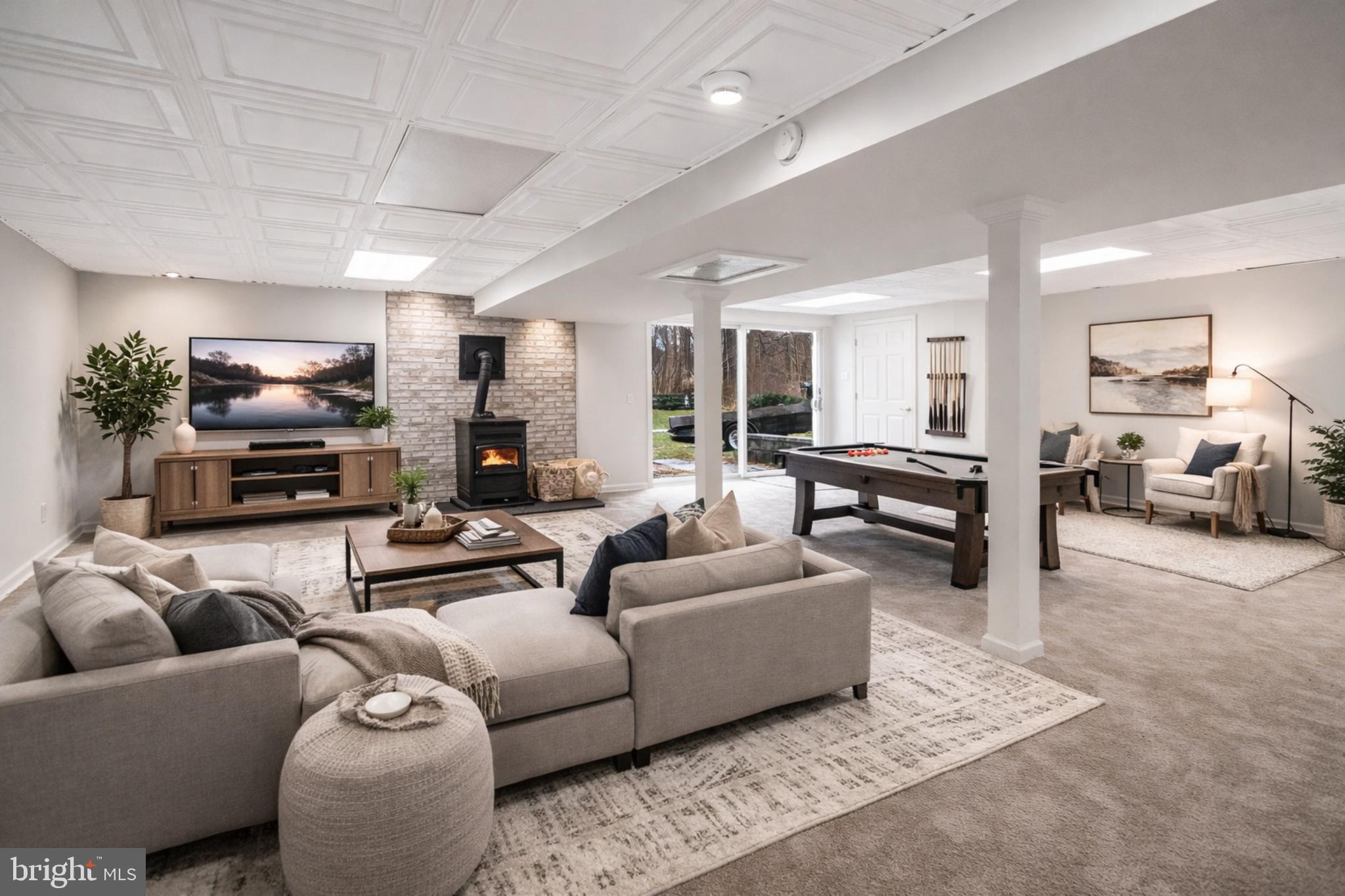 4350 Camp Kaufmann Road Huntingtown, MD 20639 - Photo 13 of 23 a living room with furniture and a flat screen tv