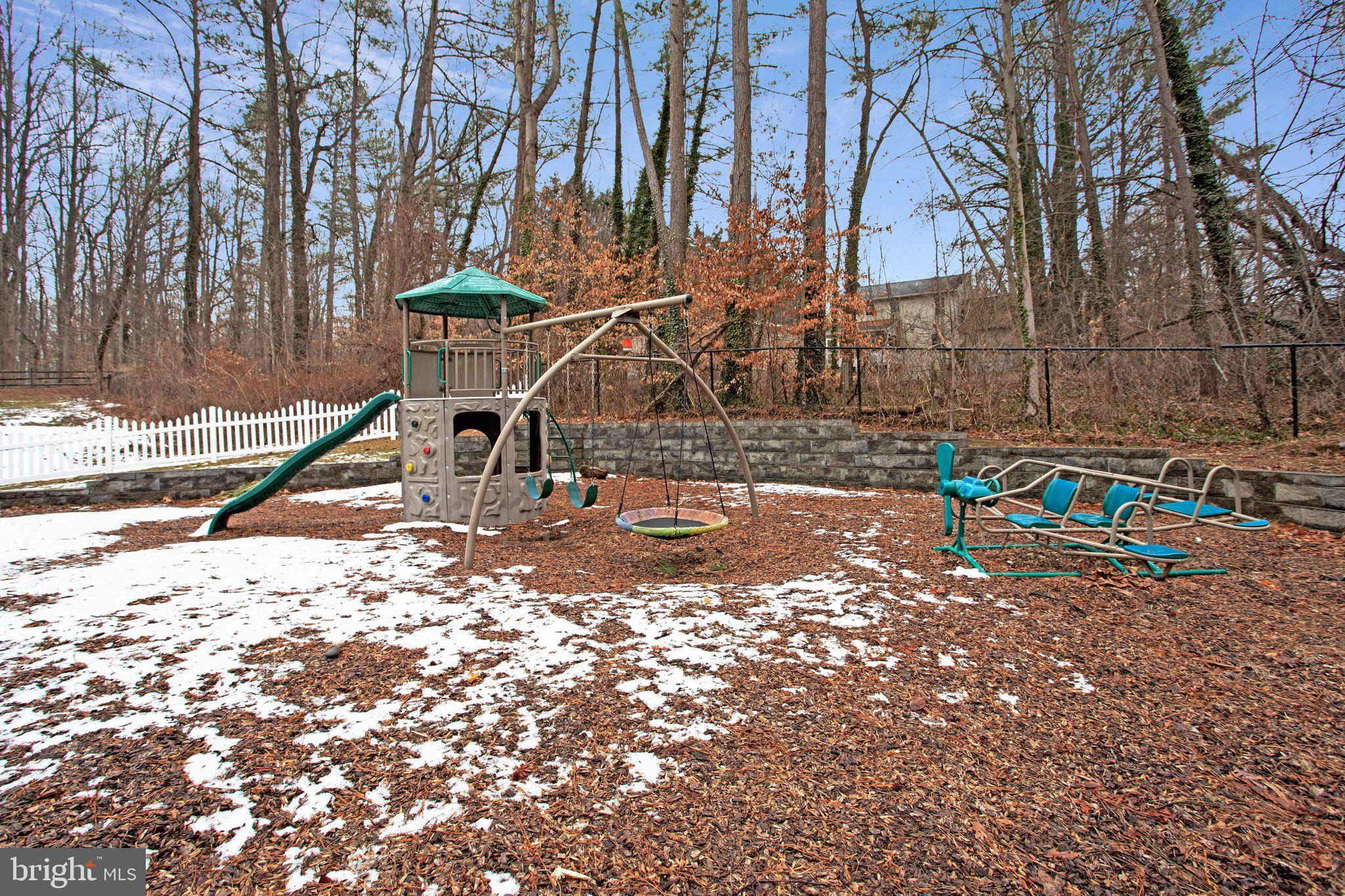 4350 Camp Kaufmann Road Huntingtown, MD 20639 - Photo 19 of 23 a backyard of a house with table and chairs