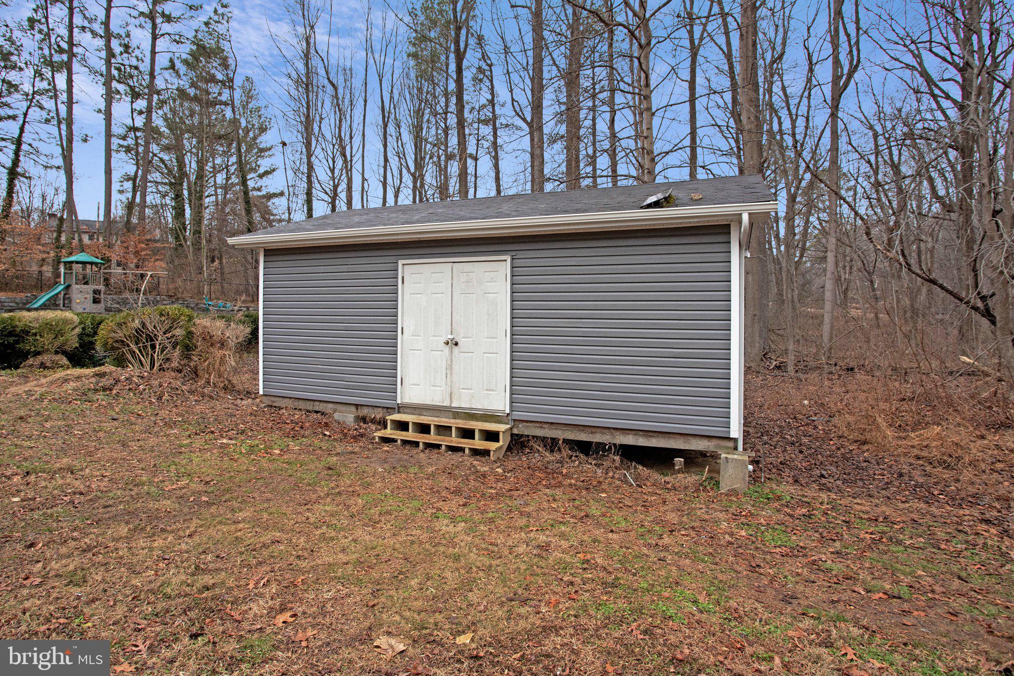 4350 Camp Kaufmann Road Huntingtown, MD 20639 - Photo 22 of 23 a backyard of a house
