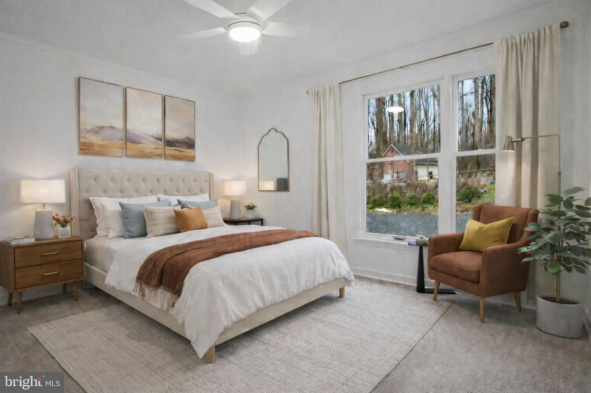 4350 Camp Kaufmann Road Huntingtown, MD 20639 - Photo 7 of 23 a bedroom with bed and a large window