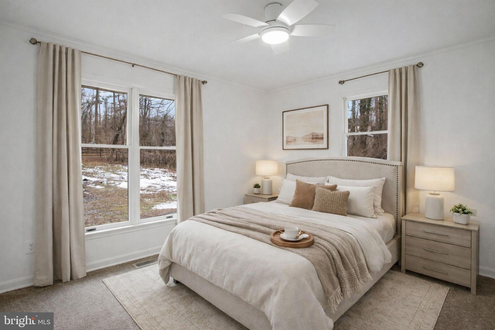 4350 Camp Kaufmann Road Huntingtown, MD 20639 - Photo 8 of 23 a bedroom with a large bed and a window