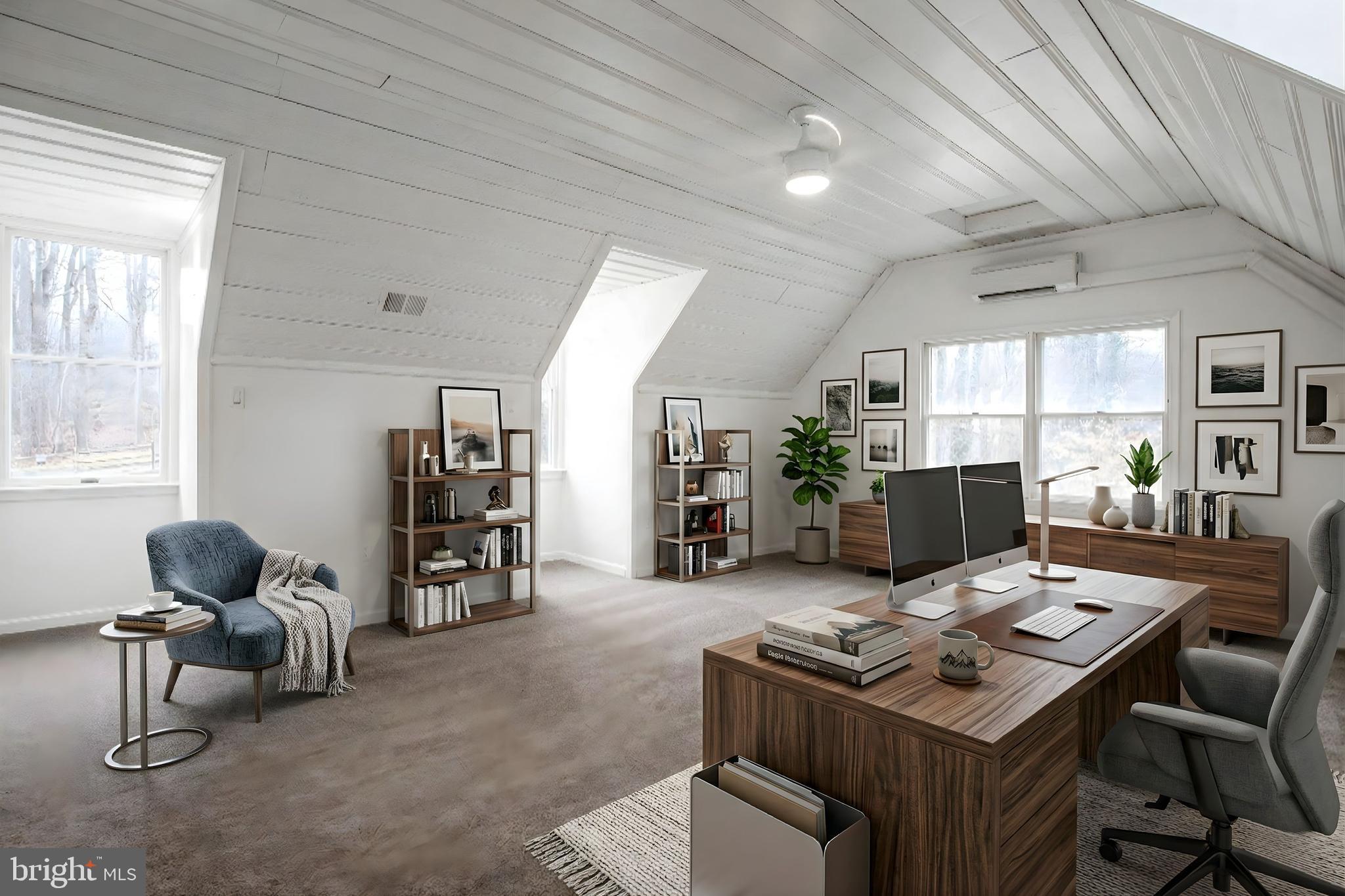 4350 Camp Kaufmann Road Huntingtown, MD 20639 - Photo 10 of 23 a view of a workspace with furniture and window