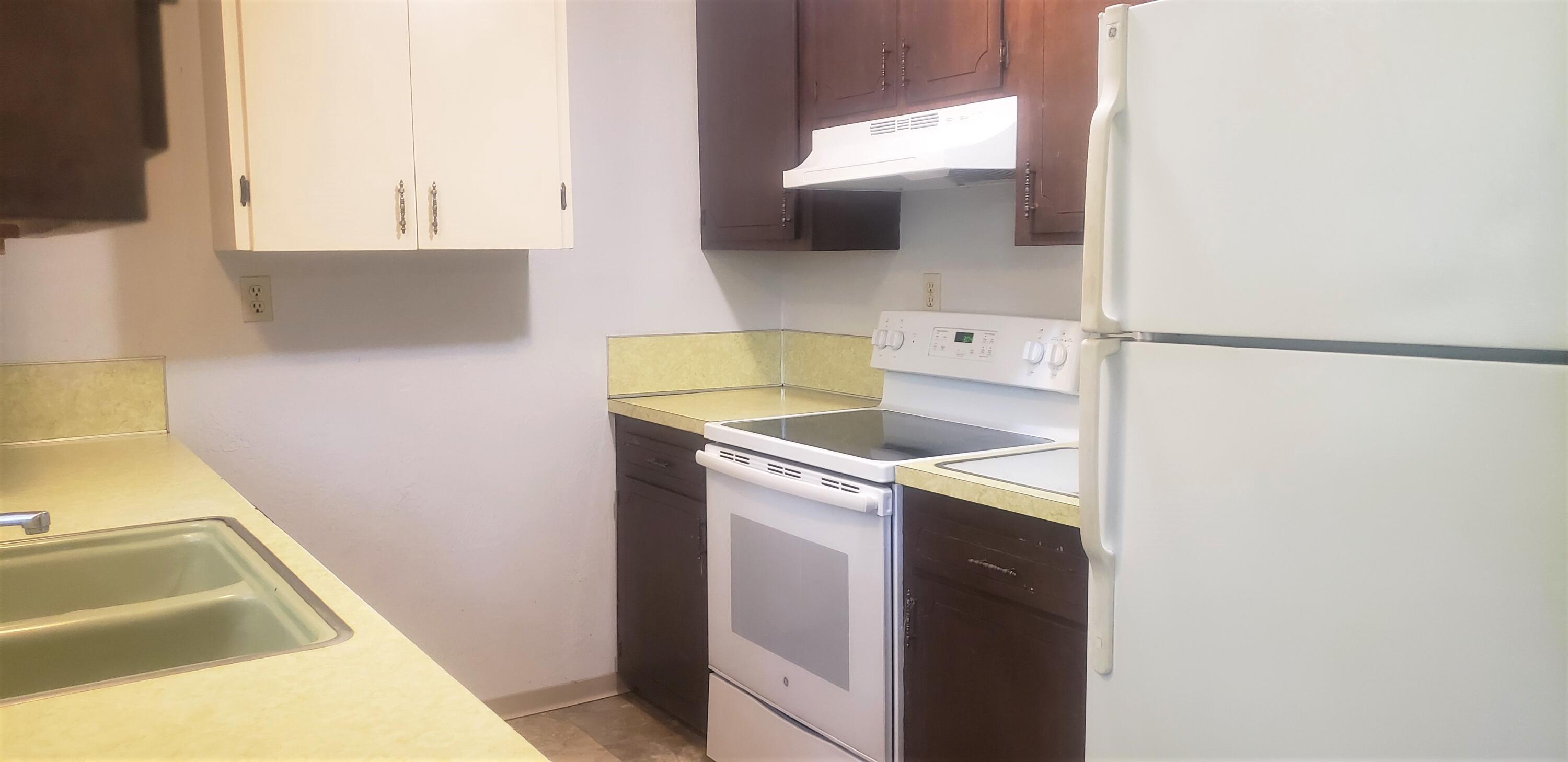 1424 Dick George Road Cave Junction, OR 97523 - Photo 3 of 23 lots of cabinetry and step saving kitchen.