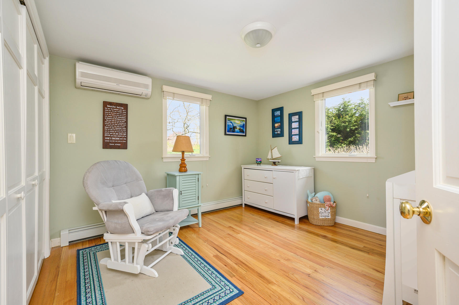 48 Locust Road Orleans, MA 02653 - Photo 18 of 36 a living room with furniture and a table