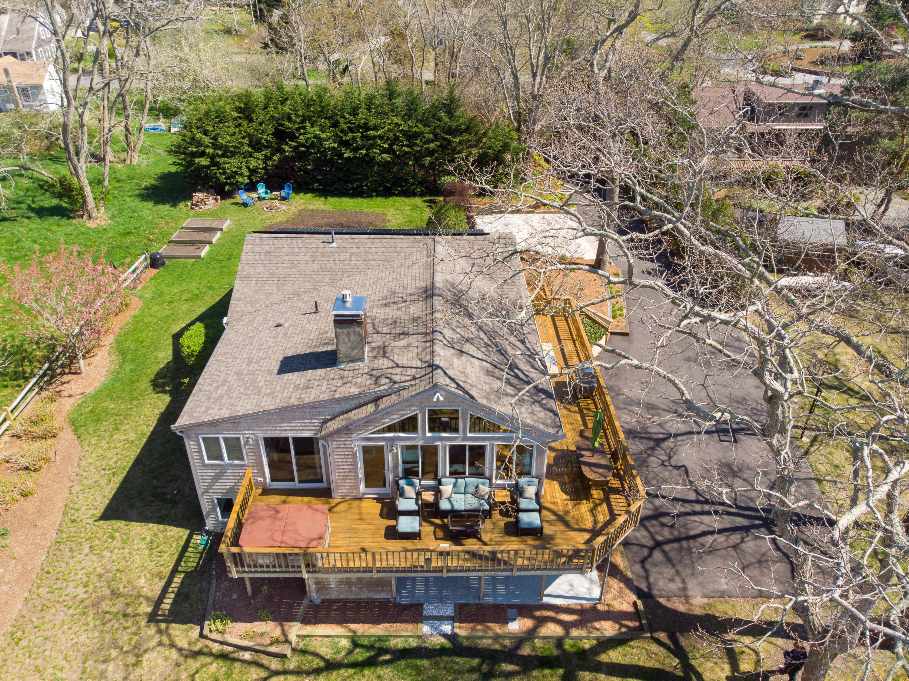 48 Locust Road Orleans, MA 02653 - Photo 34 of 36 an aerial view of a house with swimming pool and garden