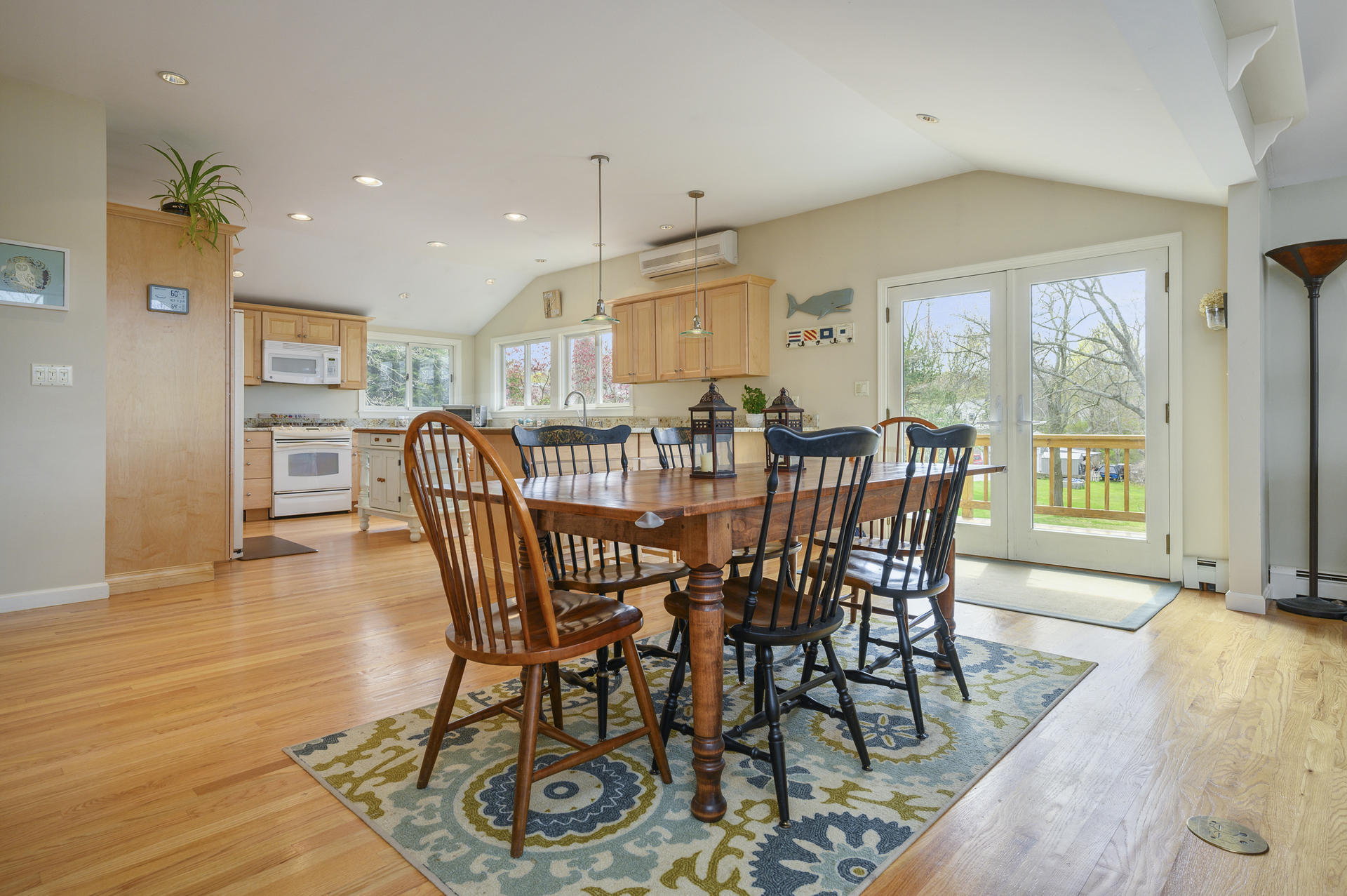 48 Locust Road Orleans, MA 02653 - Photo 10 of 36 a view of a dining room with furniture window and wooden floor