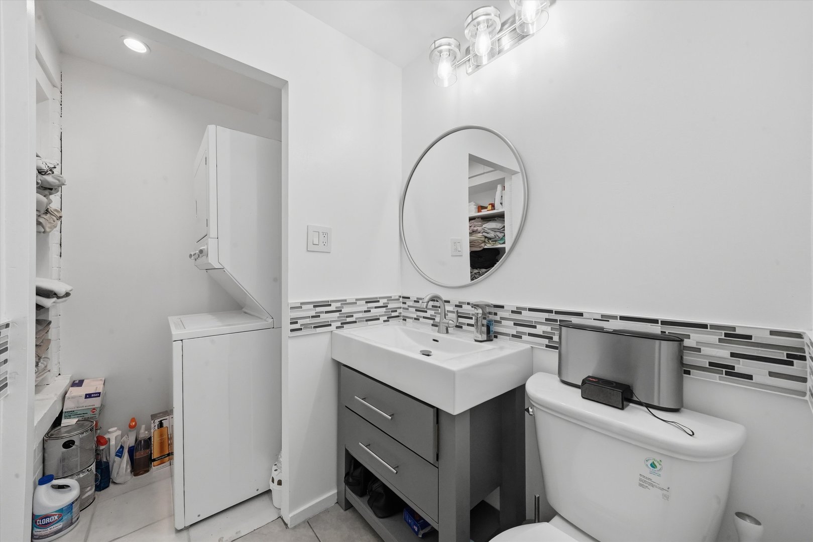 40 East 9th Street, Unit 1005 Chicago, IL 60605 - Photo 13 of 30 a bathroom with a sink mirror and toilet