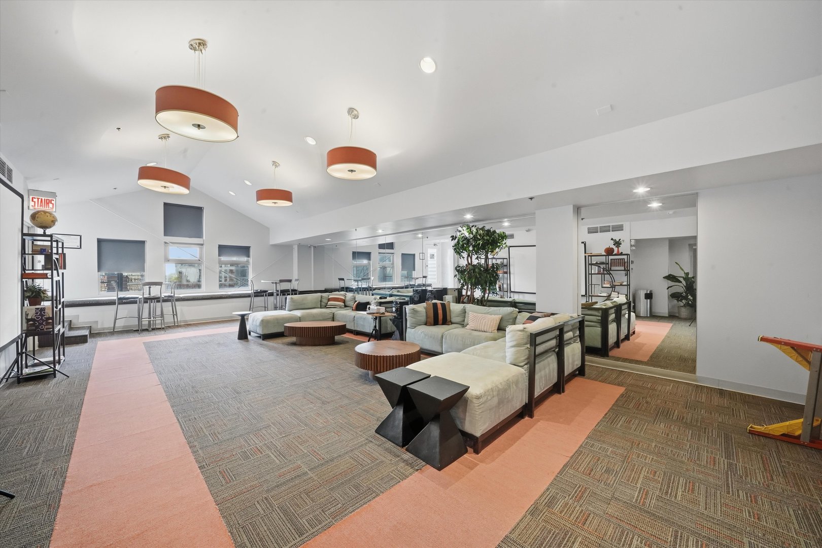 40 East 9th Street, Unit 1005 Chicago, IL 60605 - Photo 16 of 30 a living room with furniture and kitchen view