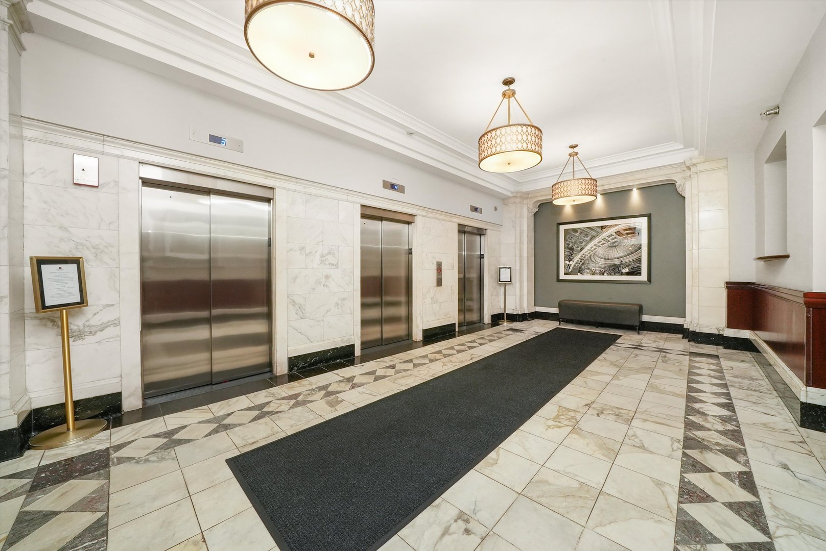 40 East 9th Street, Unit 1005 Chicago, IL 60605 - Photo 6 of 30 a view of a hallway with wooden floor and windows