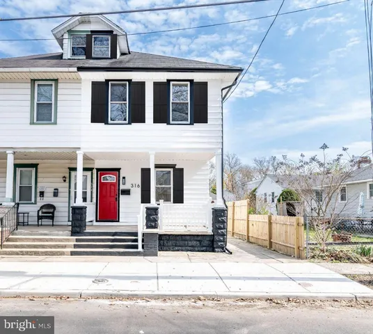 a view of a building with a street