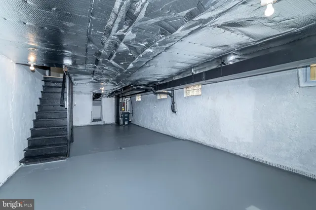 a view of a hallway with stairs