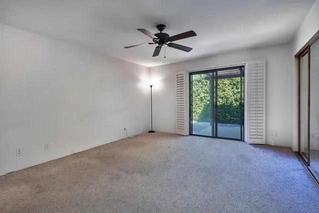 a bed room with a bed and a chandelier