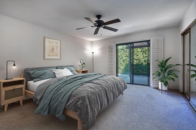 a view of an empty room with a balcony
