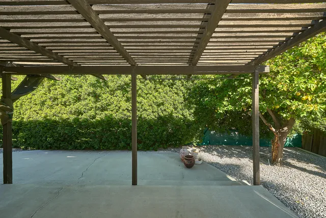 a backyard of a house with lots of green space
