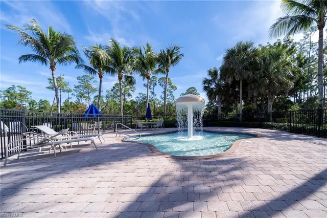 a view of outdoor space with water fountain