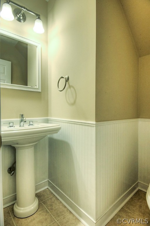 4036 Collingbourne Road Richmond, VA 23235 - Photo 17 of 43 a bathroom with a sink and a mirror