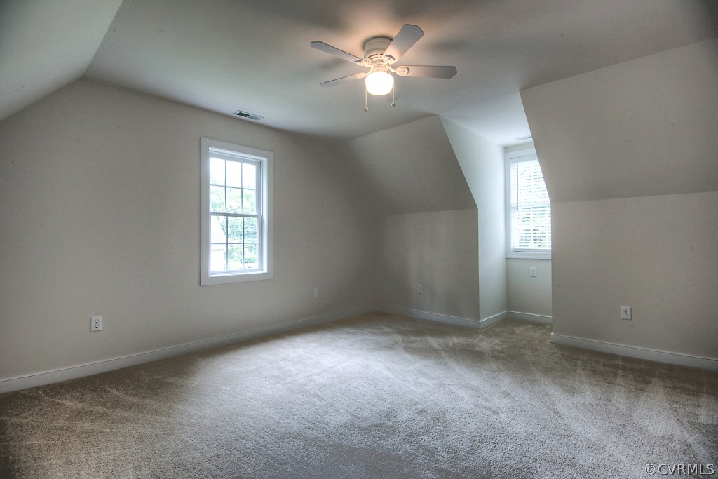 4036 Collingbourne Road Richmond, VA 23235 - Photo 29 of 43 an empty room with windows and fan