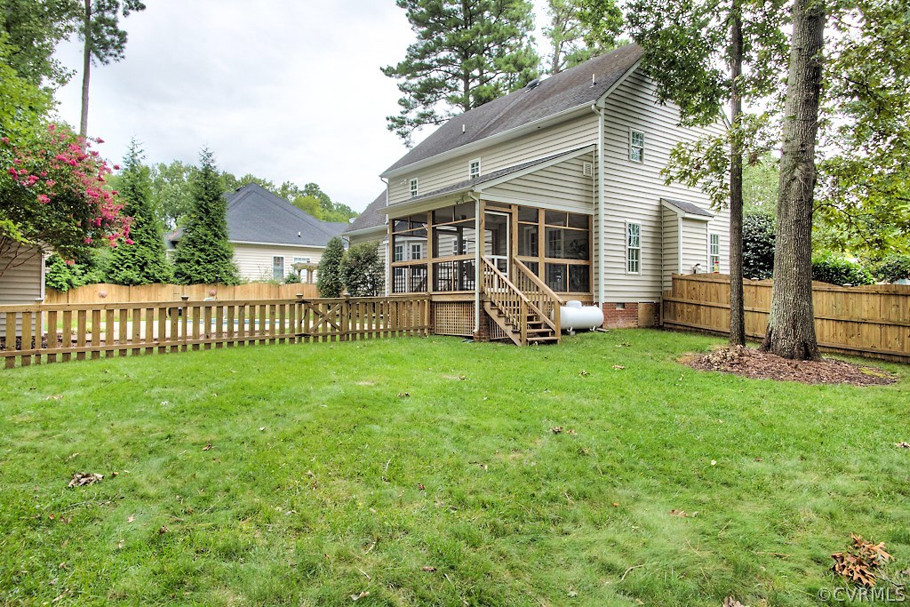 4036 Collingbourne Road Richmond, VA 23235 - Photo 3 of 43 a front view of a house with garden