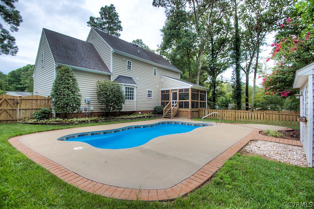 4036 Collingbourne Road Richmond, VA 23235 - Photo 39 of 43 a view of a house with swimming pool and yard