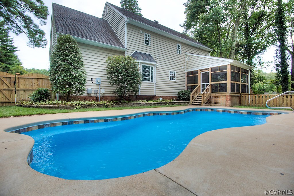 4036 Collingbourne Road Richmond, VA 23235 - Photo 41 of 43 a view of a house with a swimming pool and sitting area