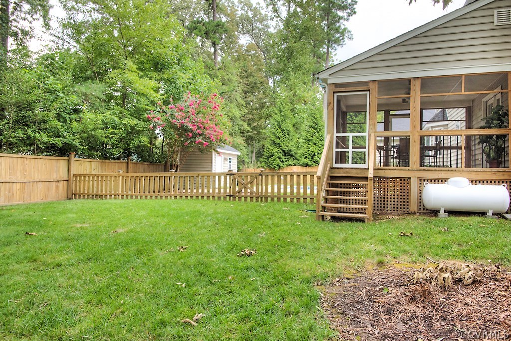 4036 Collingbourne Road Richmond, VA 23235 - Photo 42 of 43 a view of a house with backyard and porch