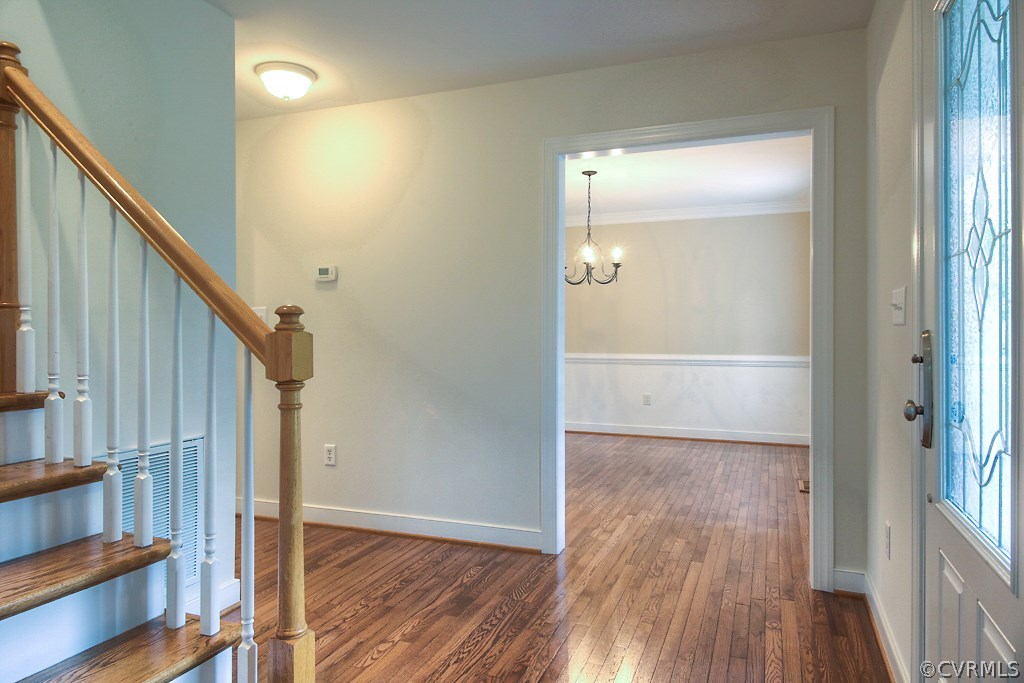 4036 Collingbourne Road Richmond, VA 23235 - Photo 6 of 43 a view of an entryway with wooden floor