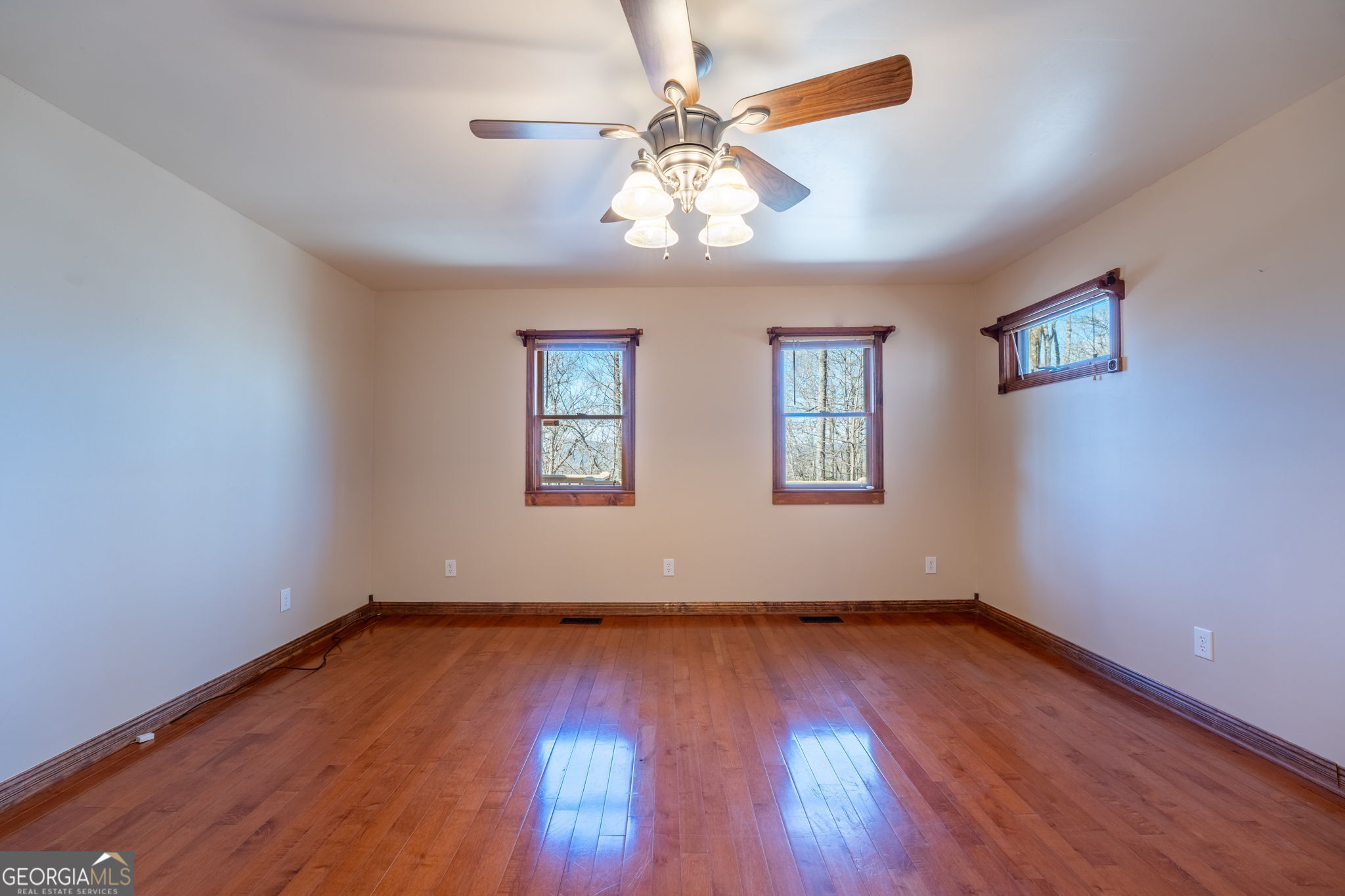 44 Juniper Trail Clayton, GA 30525 - Photo 21 of 87 wooden floor in an empty room with a window