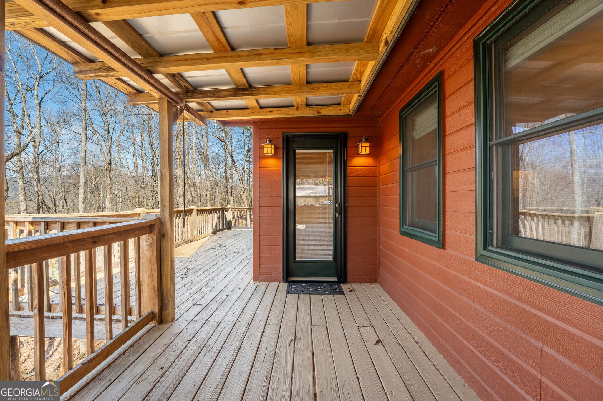 44 Juniper Trail Clayton, GA 30525 - Photo 28 of 87 a view of a porch with wooden floor and city view