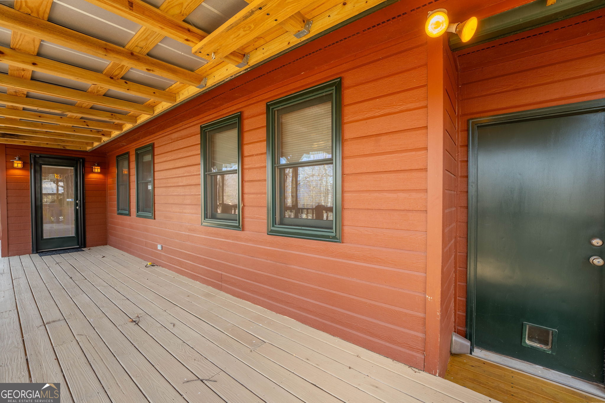 44 Juniper Trail Clayton, GA 30525 - Photo 29 of 87 a view of an empty room with wooden floor and a window