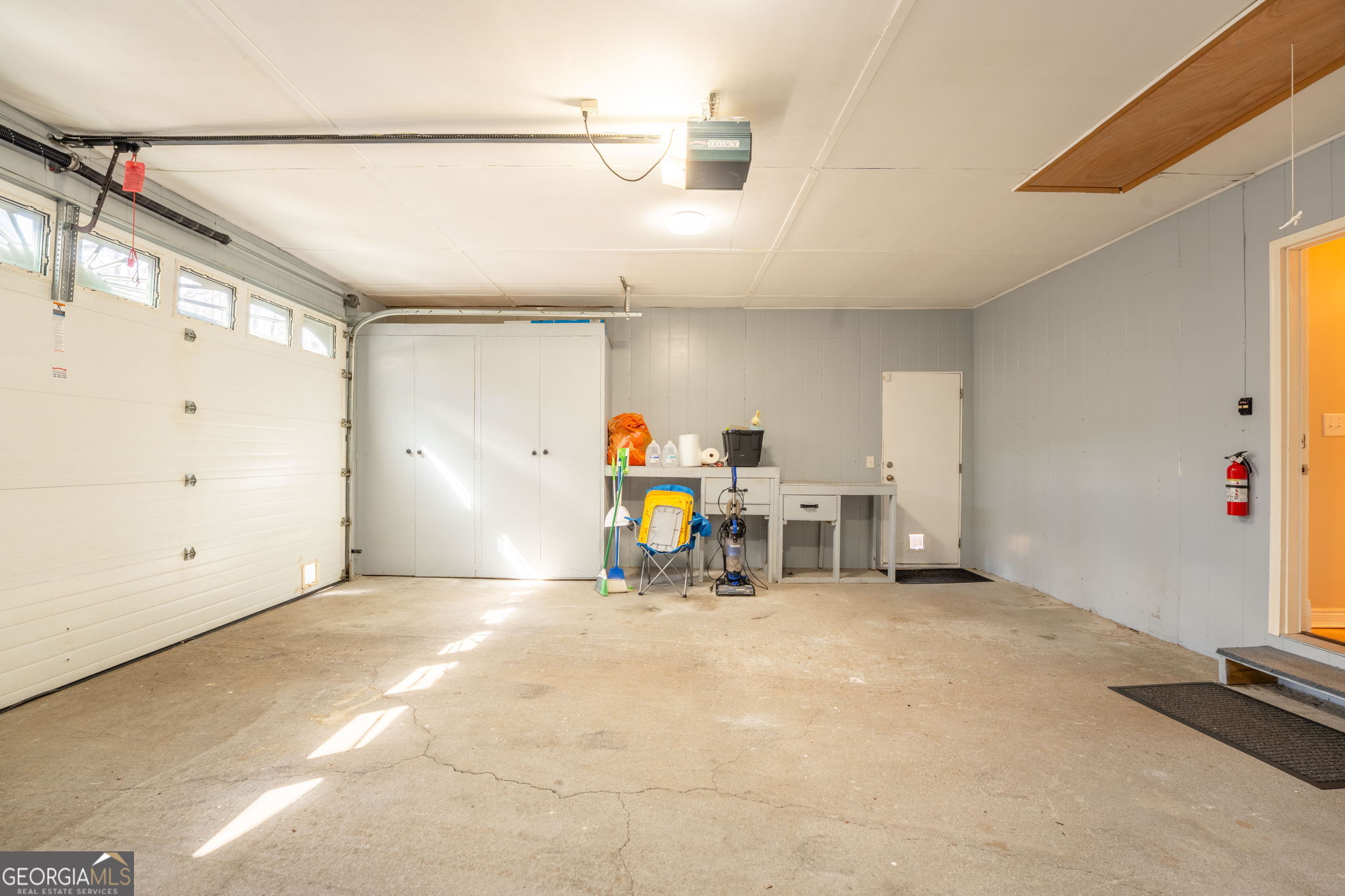 44 Juniper Trail Clayton, GA 30525 - Photo 50 of 87 a view of a room with gym equipment and a window