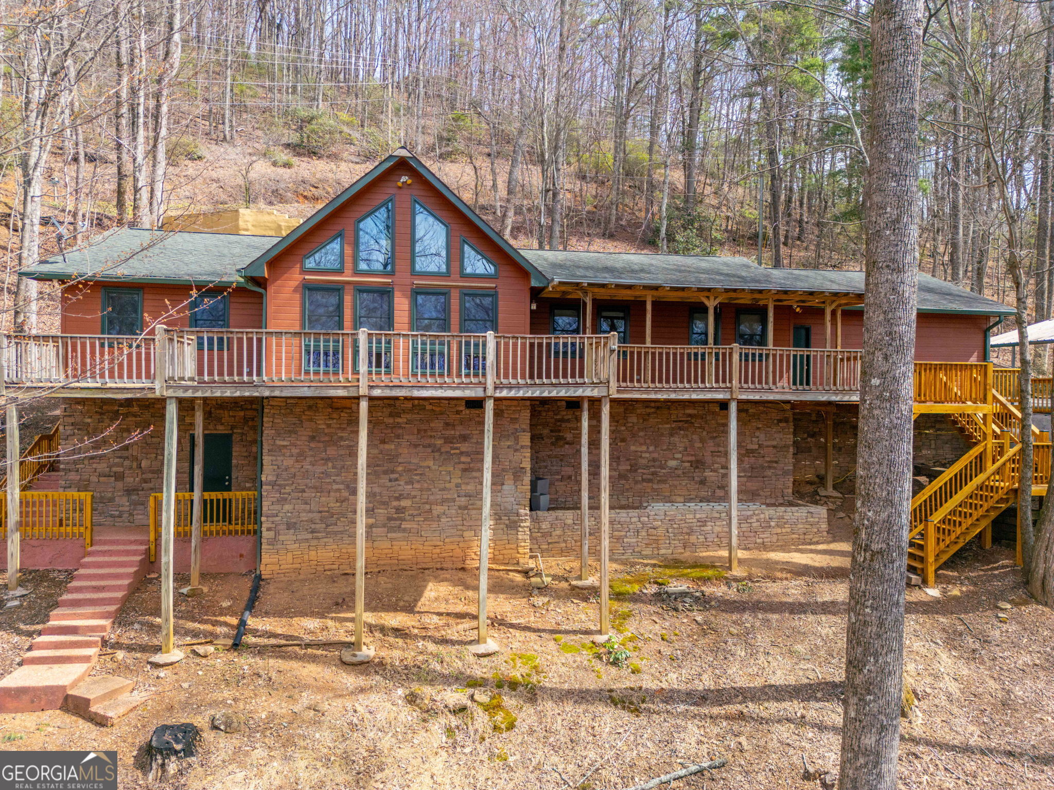 44 Juniper Trail Clayton, GA 30525 - Photo 65 of 87 a view of a house with a yard and large windows