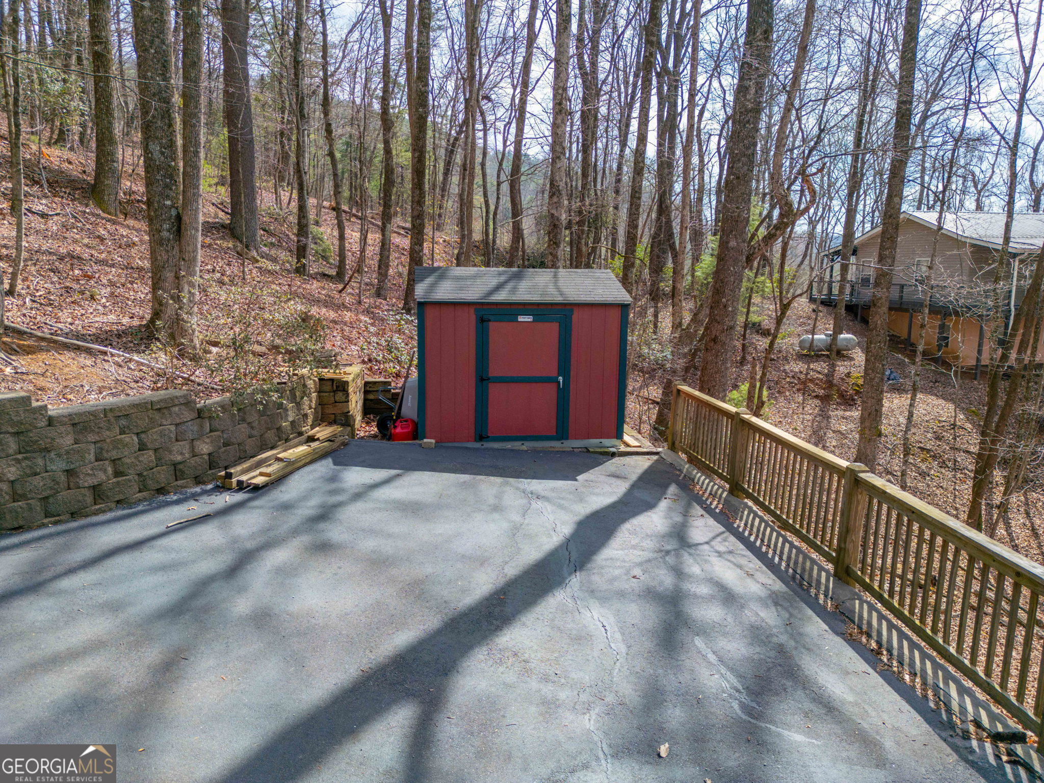 44 Juniper Trail Clayton, GA 30525 - Photo 70 of 87 a view of a pathway of a house with a yard and wooden fence