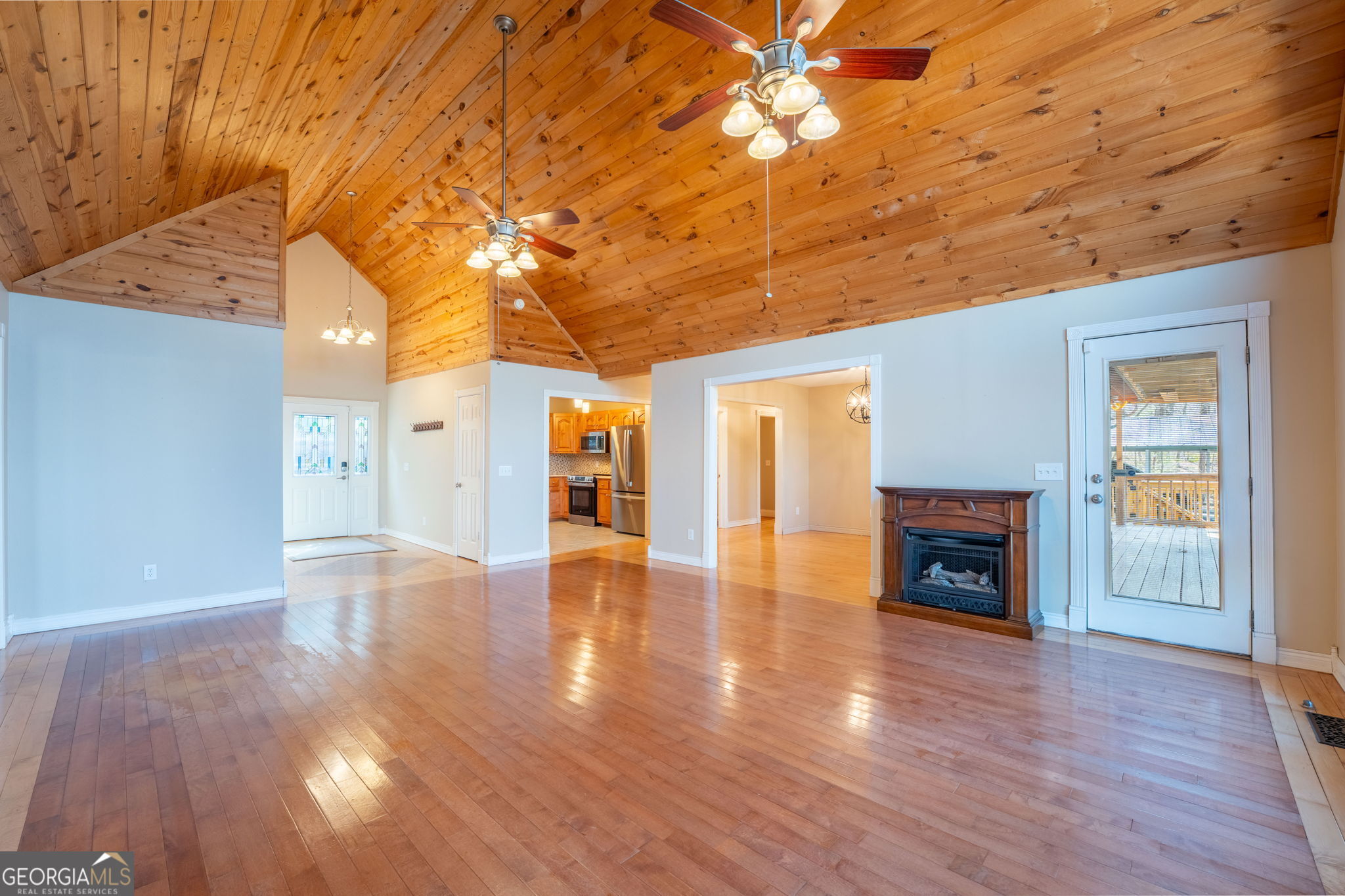 44 Juniper Trail Clayton, GA 30525 - Photo 8 of 87 a view of empty room with wooden floor and fireplace