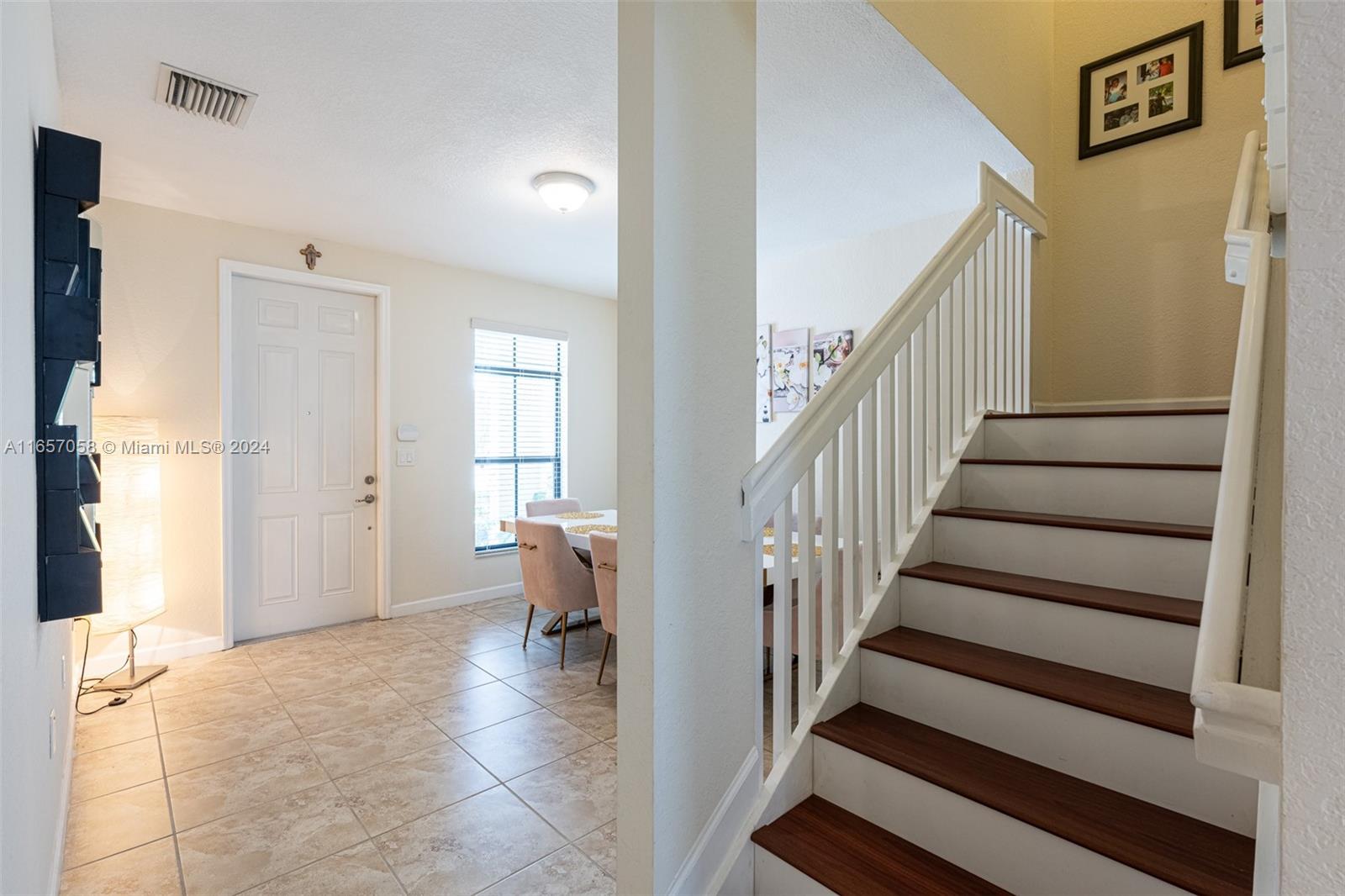 23578 Southwest 113th Path Homestead, FL 33032 - Photo 20 of 59 a view of entryway and hall with wooden floor